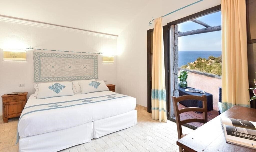 Фотографія Arbatax Park Resort Borgo Cala Moresca 4*