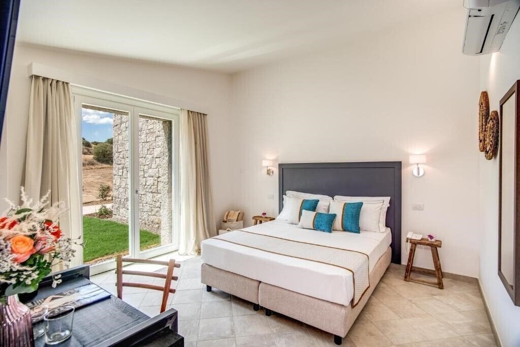 Фото Cala Sinzias Resort 4*