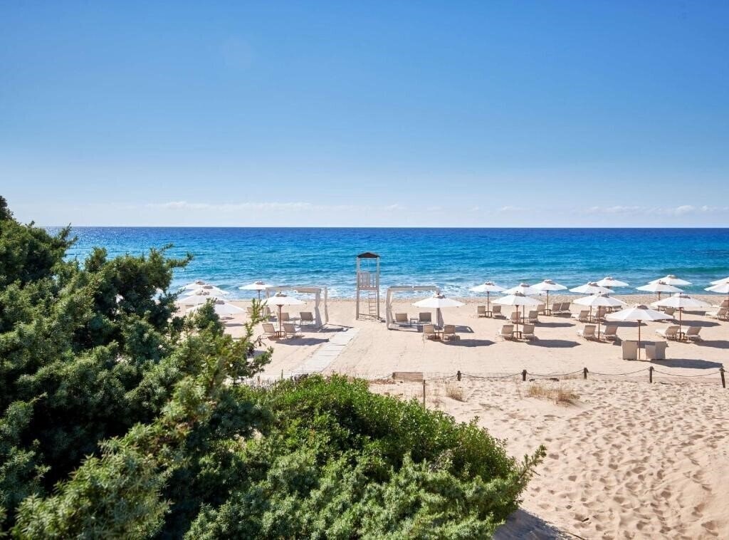 Картинка Conrad Chia Laguna Sardinia 5*
