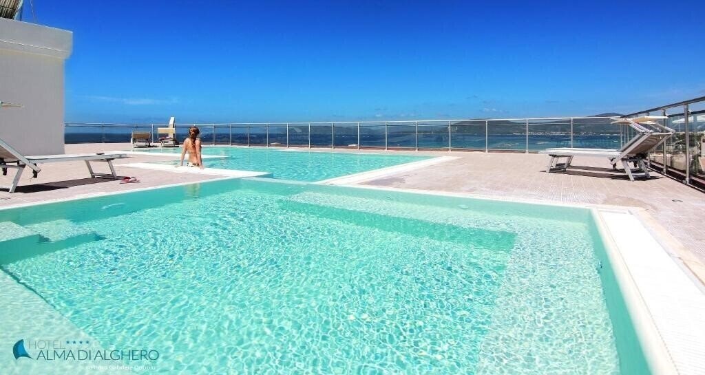 Отель Alma Di Alghero 4*