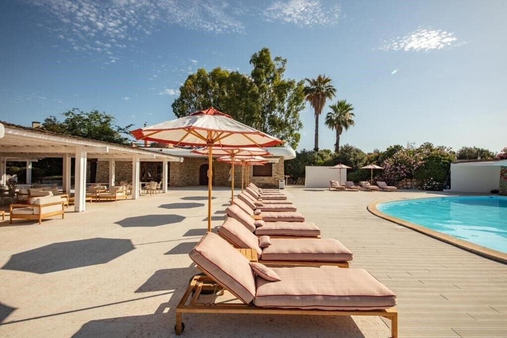 Фотографія Is Molas Resort 4*
