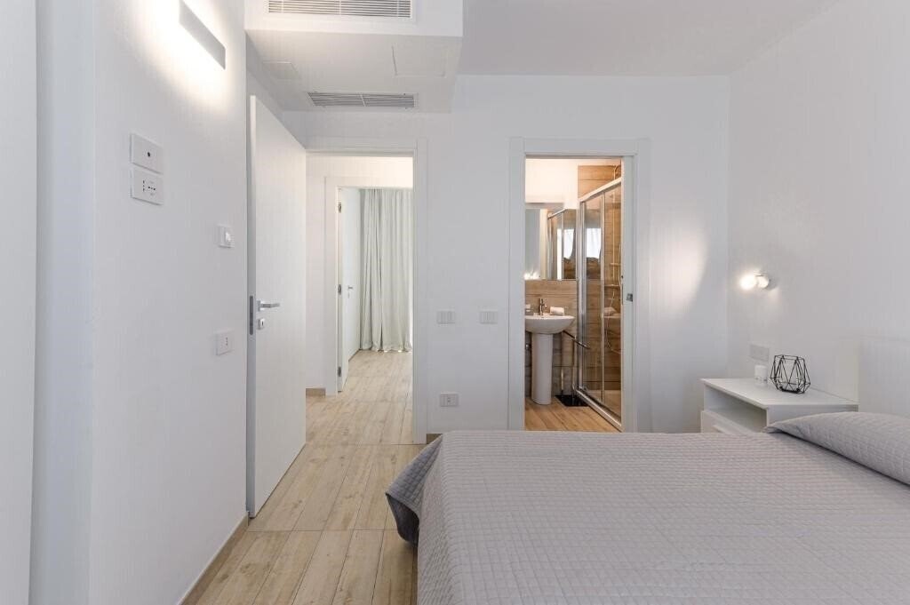 Фото Capo Falcone Charming Apartments 3*