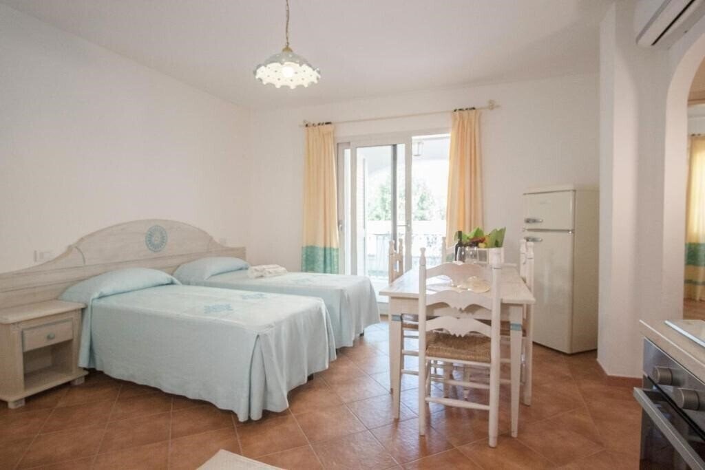 Фотография Le Residenze Del Golfo Di Orosei 3*