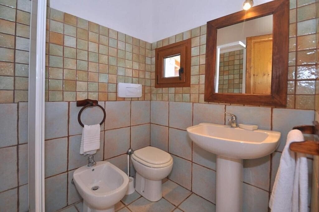Фотографія Stazzi di Gallura Mare di Ginepri 3*