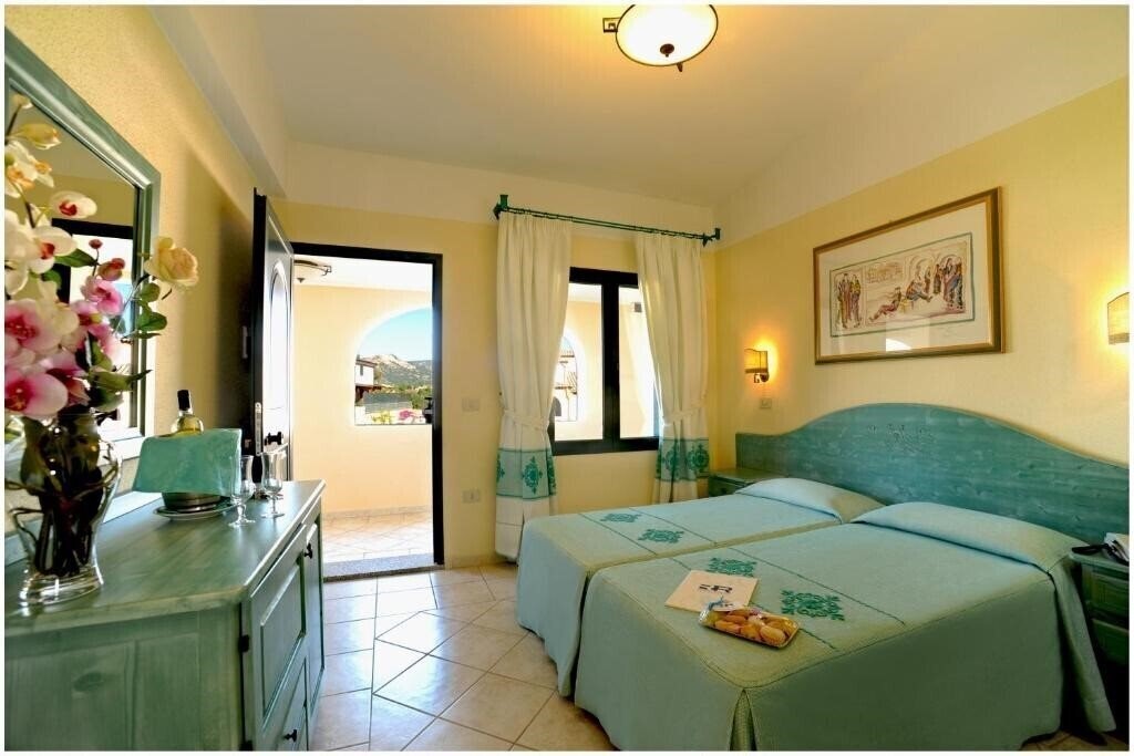 Фото Cala Liberotto Residence 4*