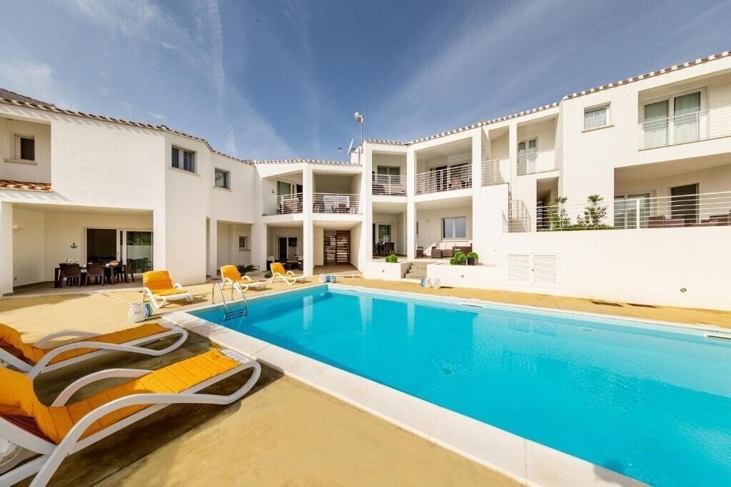 Изображение Caneis Apartments 4*