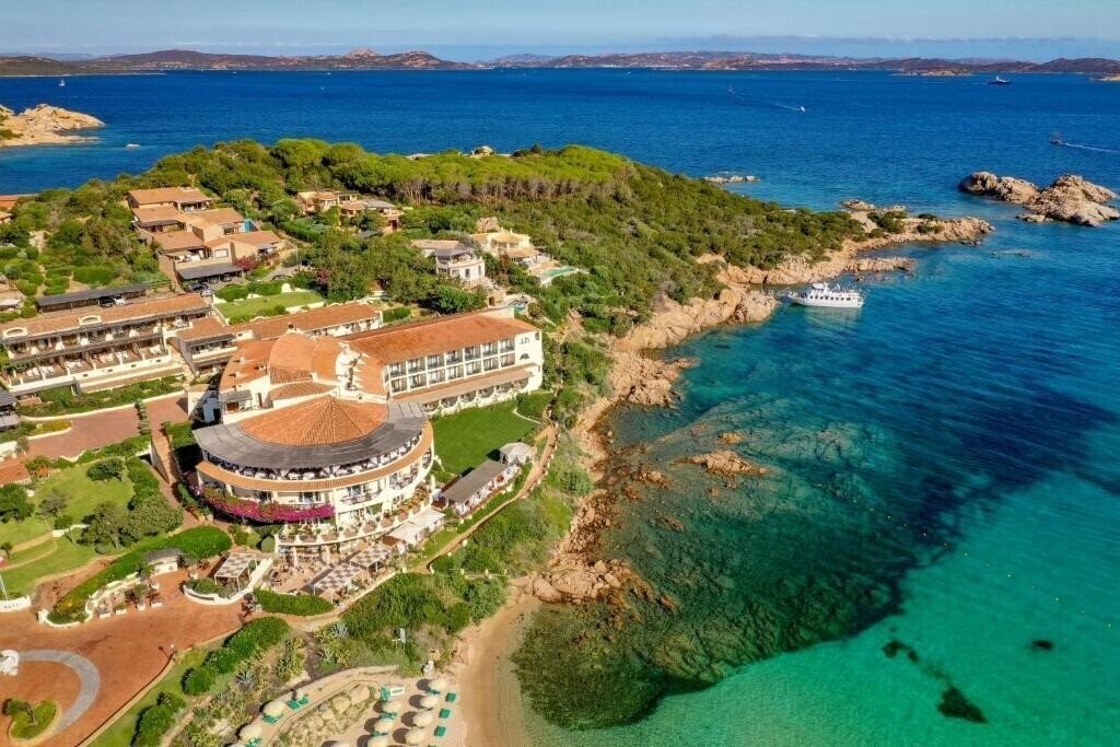 Готель Club Hotel Baia Sardinia 4*