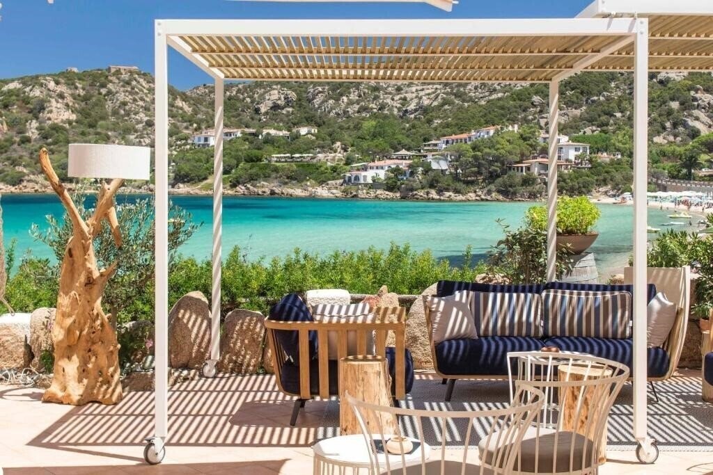 Фотографія Club Hotel Baia Sardinia 4*
