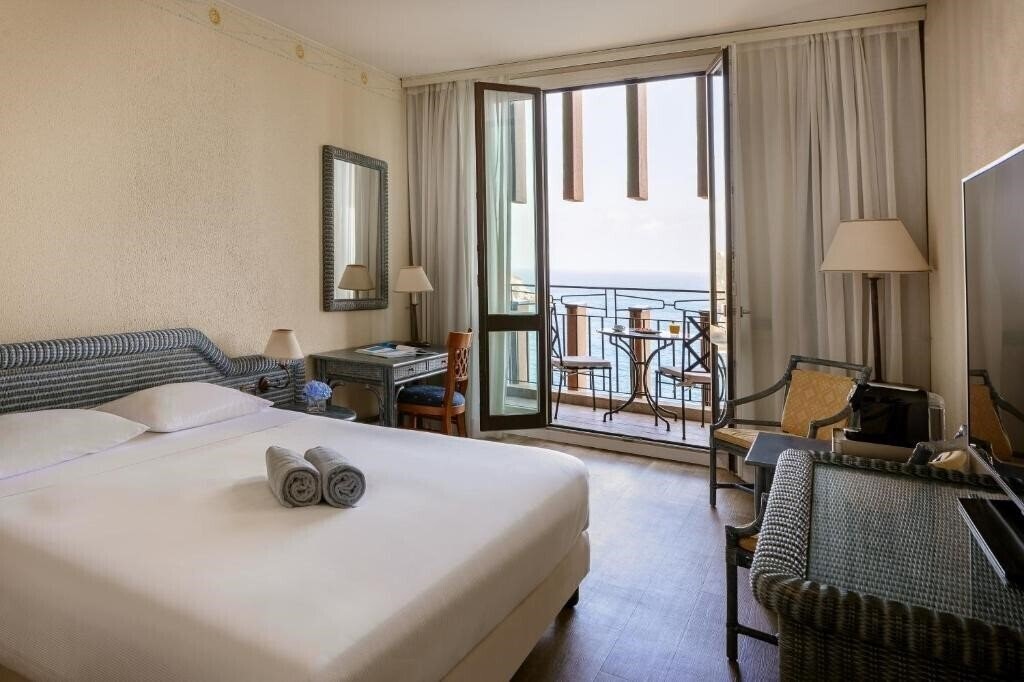 Фото UNA Hotels Capotaormina 4*