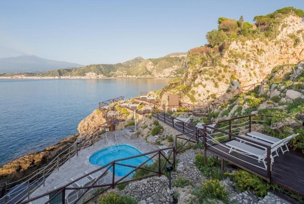 Фотографія UNA Hotels Capotaormina 4*