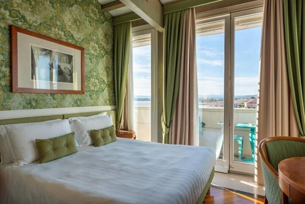 Фото Grand Hotel Ortigia 5*