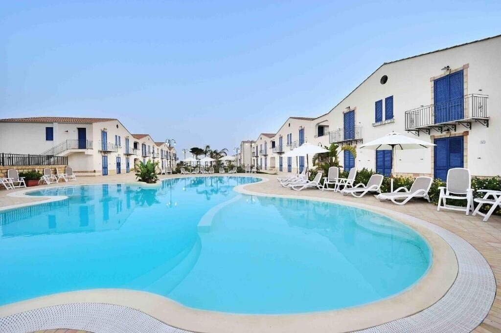 Отель Scala dei Turchi Resort 4*