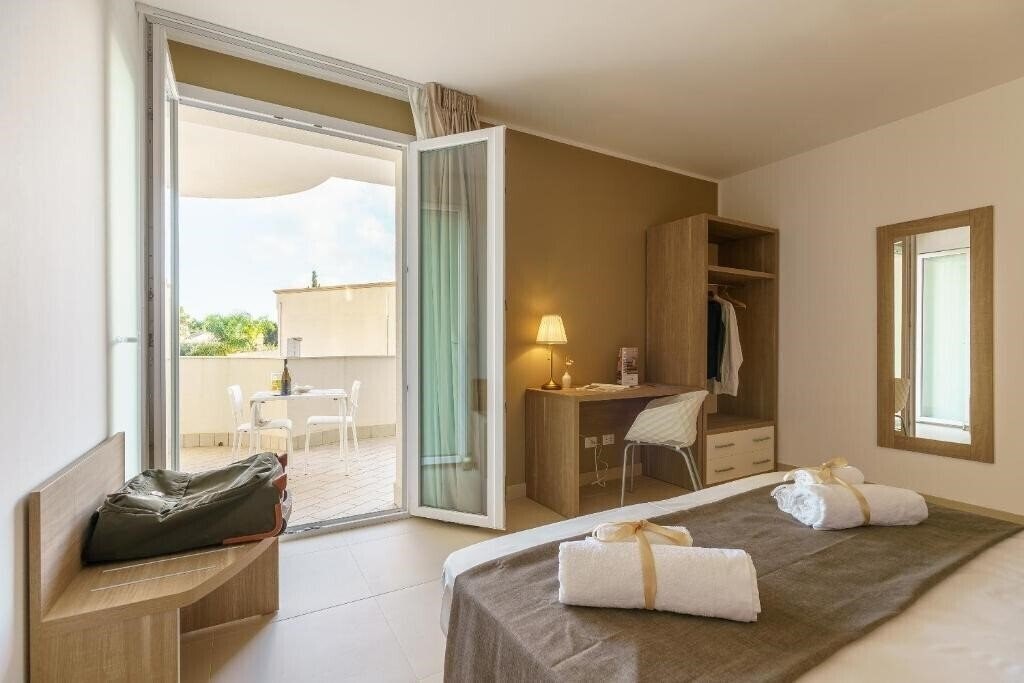 Фото Travini Hotel Residence 4*