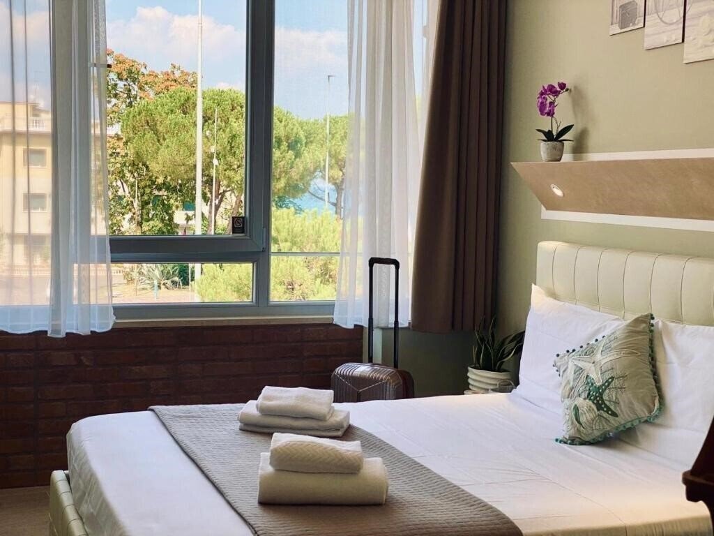 Фото Atico Hotel 3*