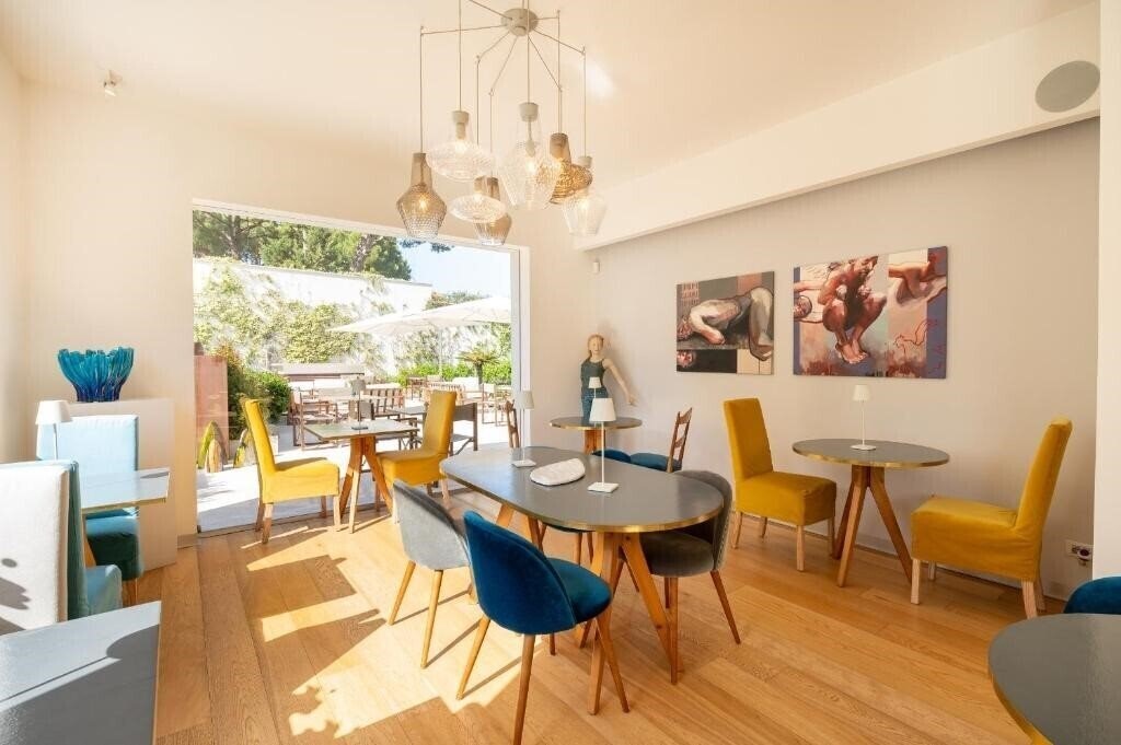 Фотографія Unico Boutique Hotel D'Arte 4*