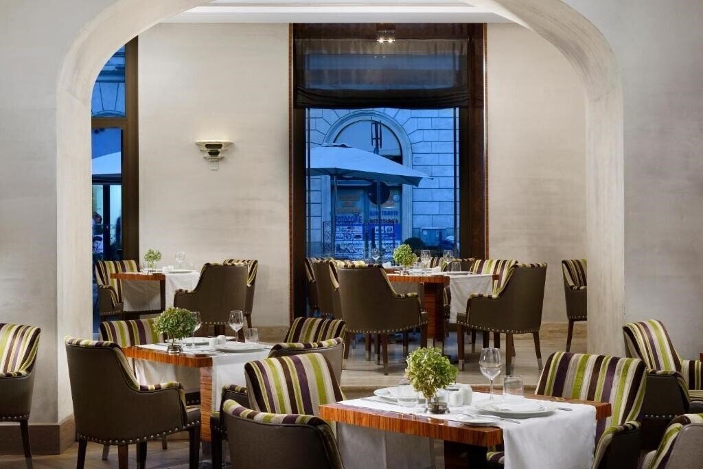 Фото Una Hotel Roma 4*