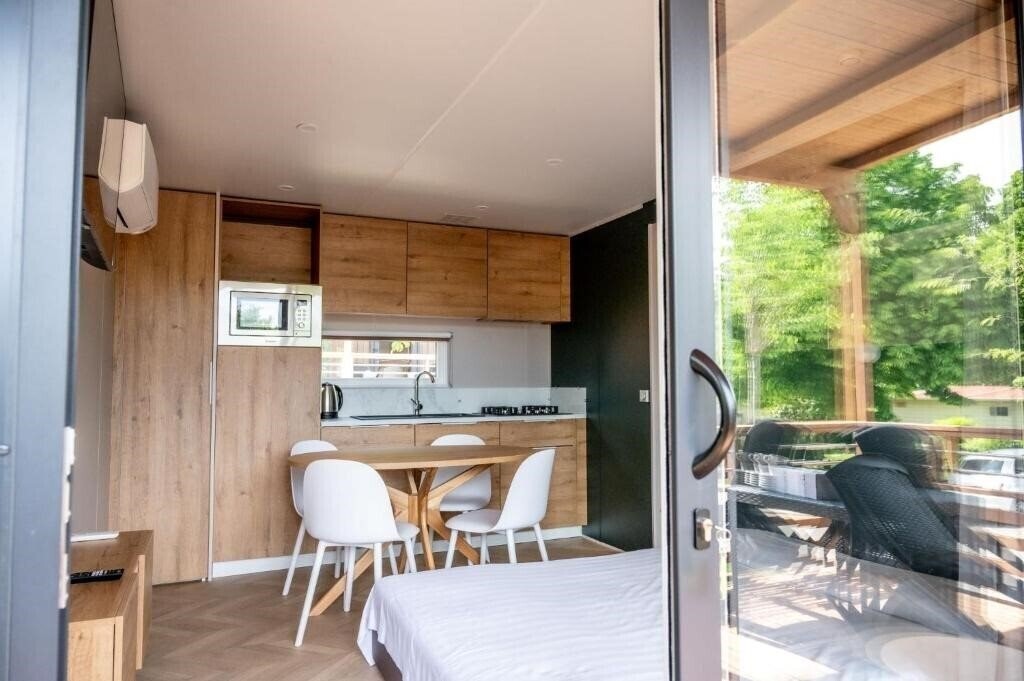 Фотографія Flaminio Village Bungalow Park 4*