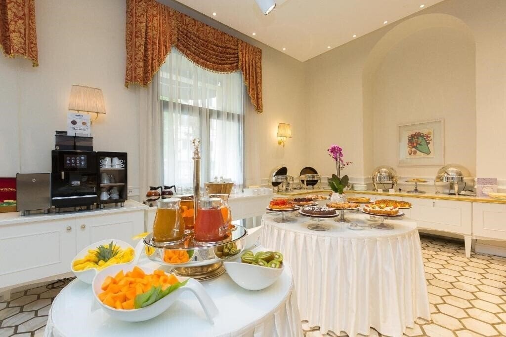 Фотографія Milton Hotel Roma 4*