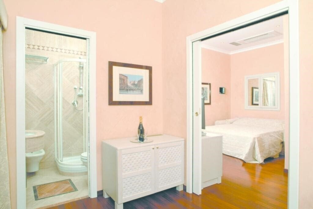 Фото Colosseo Studio Suites отель без категории