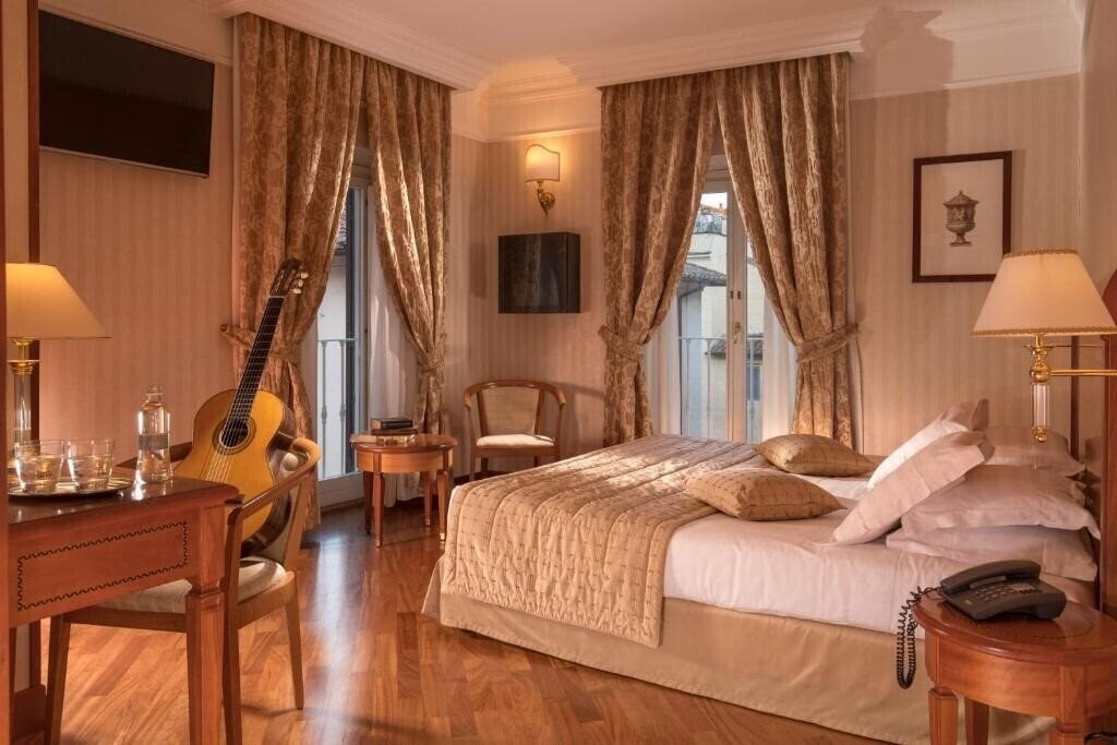 Фото Albergo Ottocento 4*
