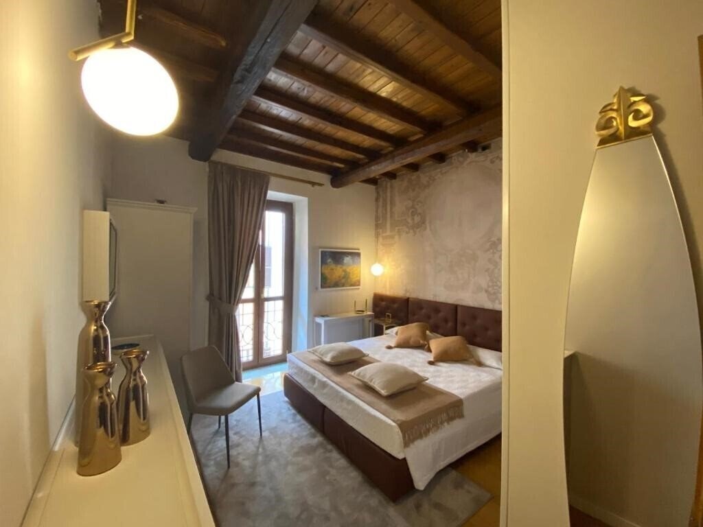 Отель Condotti Rooms 4*