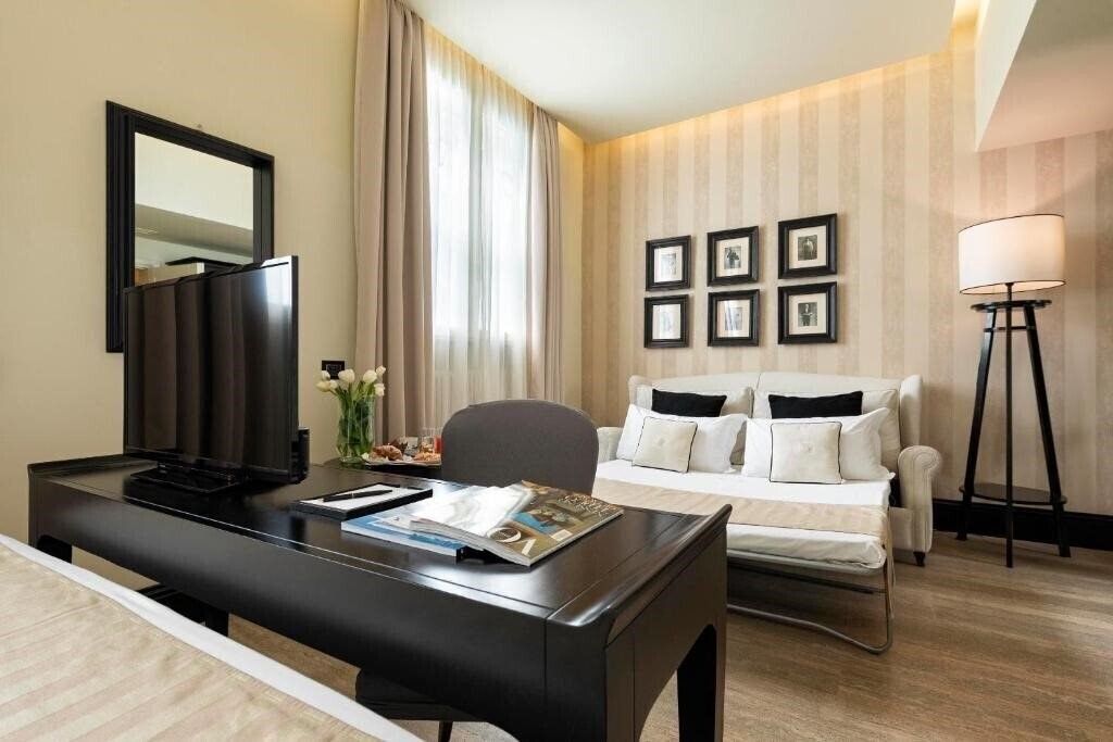 Отель Profumo Maison Colosseo 3*