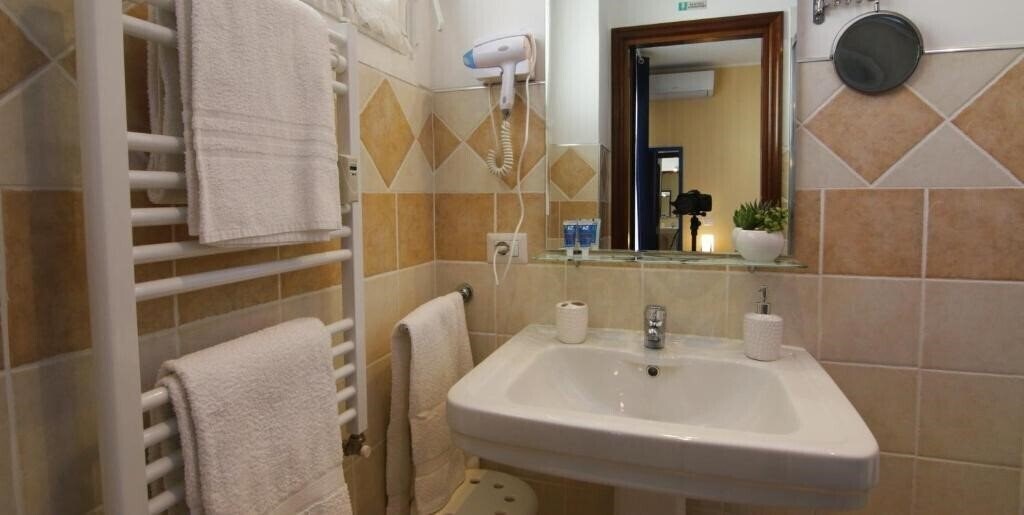 Фотографія B&B La Perla di Roma 3*