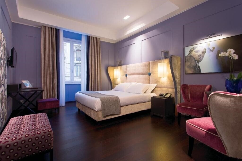 Готель Stendhal Luxury Suites 4*