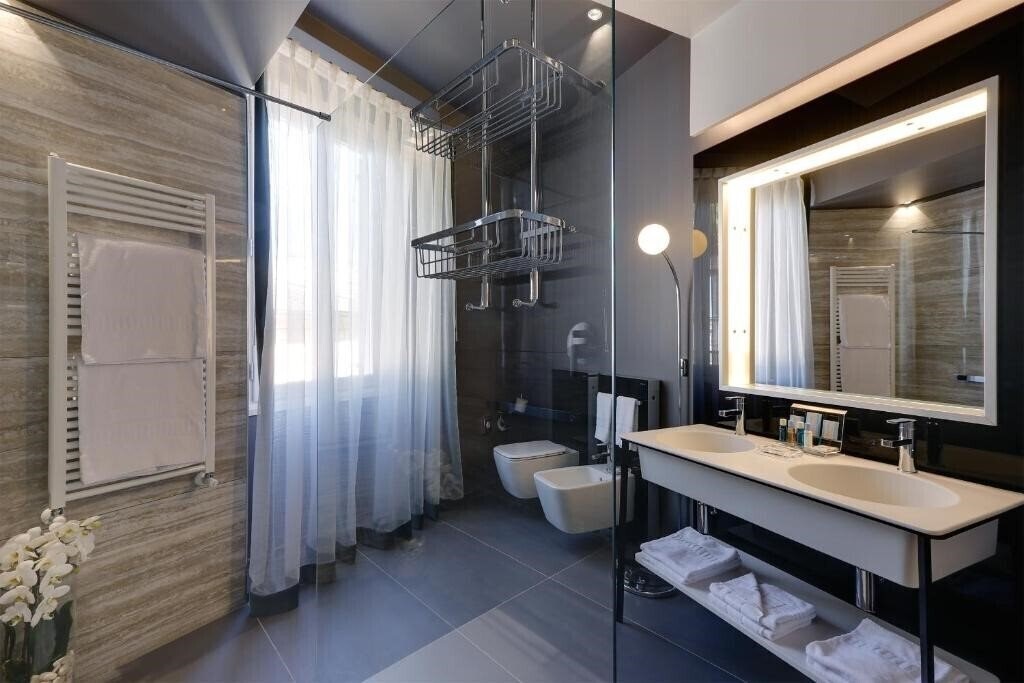 Фотографія Stendhal Luxury Suites 4*
