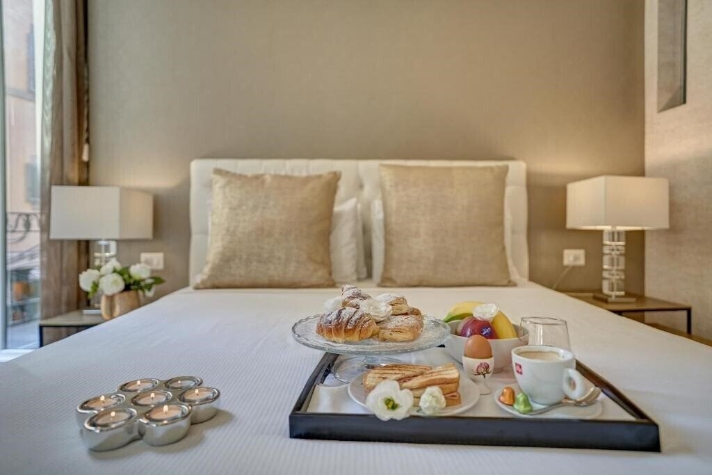 Отель Spagna Boutique Luxury Suites 3*