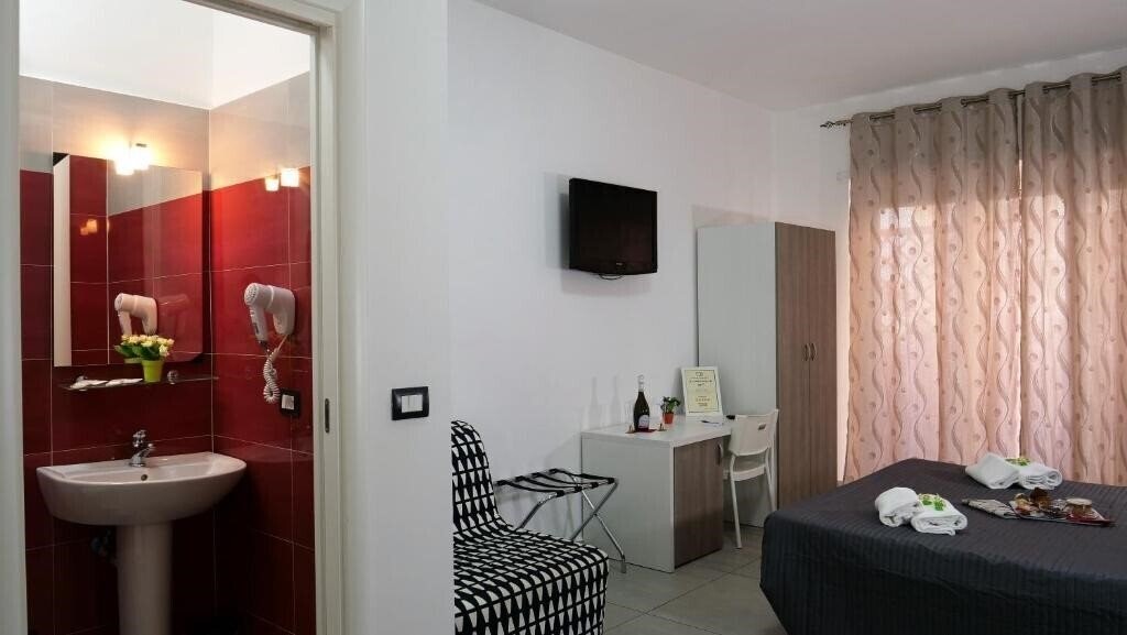 Фото Tiburtina Royal Suites 3*