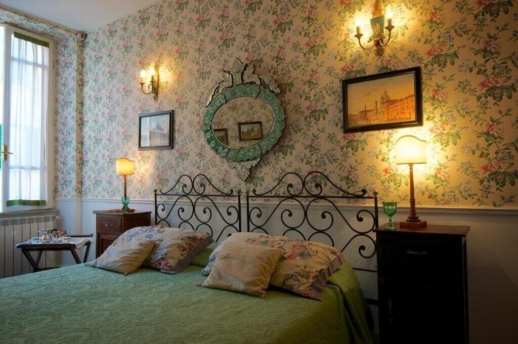 Отель Guest House Arco dei Tolomei 3*