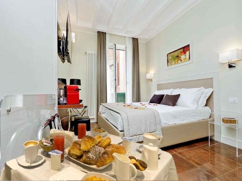 Отель Piazza Venezia Grand Suite 4*