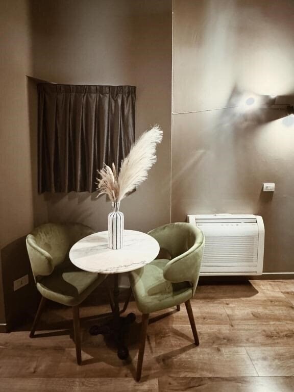 Фотографія Residenza Sciarra Suites 4*