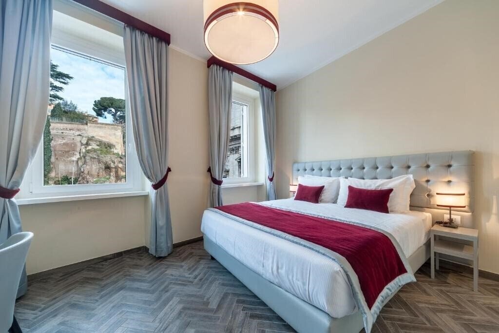 Готель Foro Romano Luxury Suites 3*