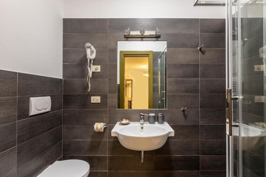 Фотографія La Riviere Guesthouse Trastevere 3*