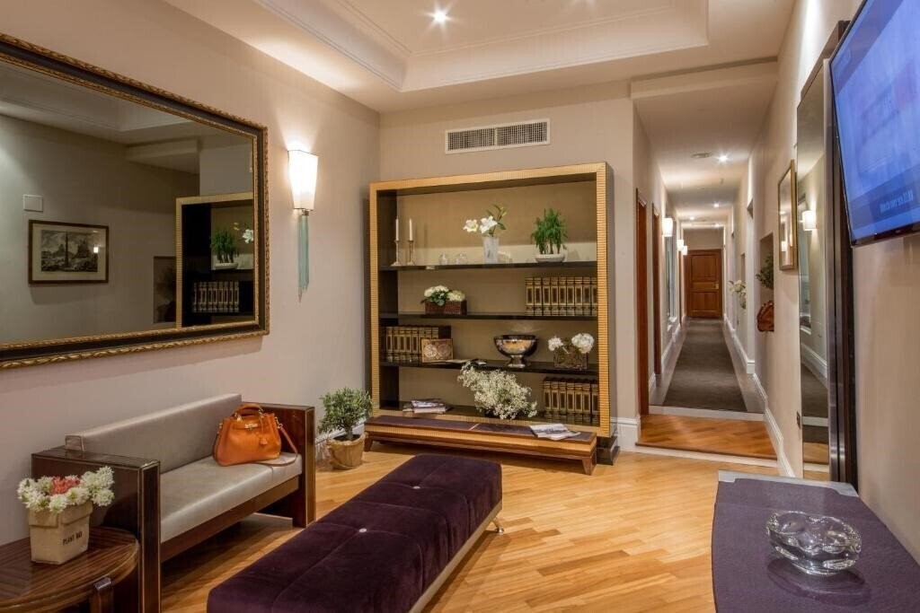 Изображение Tridente Suites 4*