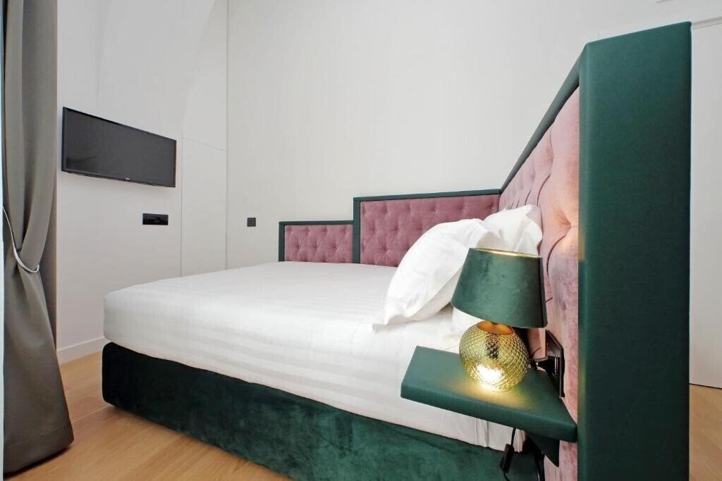 Фото Domus Aurea Luxury Suites 4*