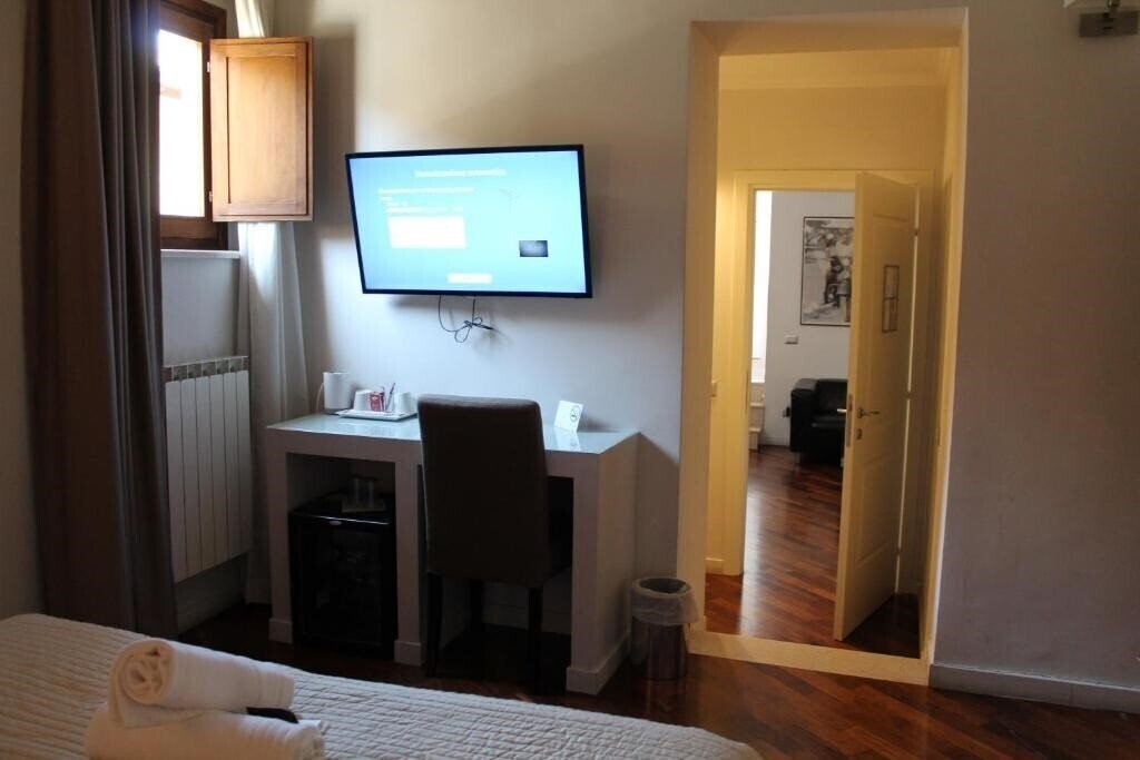 Фото Relais Arco Della Pace 3*