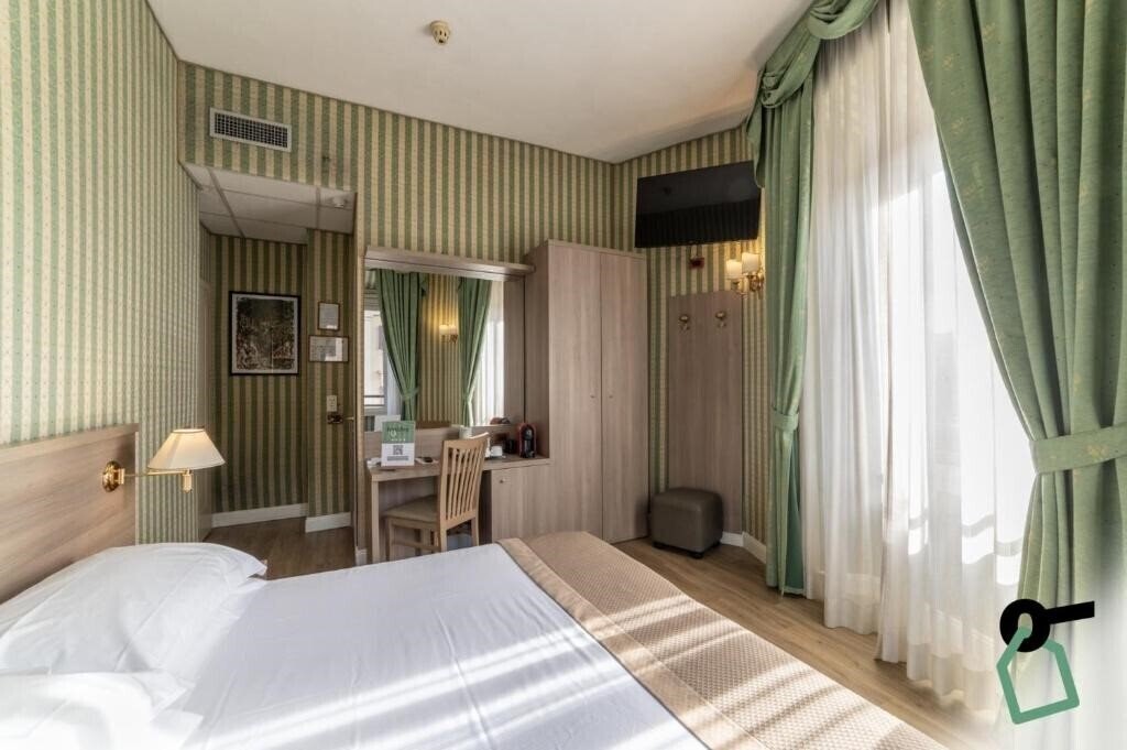 Изображение Hotiday Room Collection Roma Porta Pia 4*