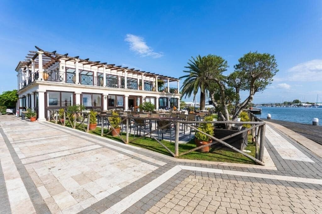 Картинка Porto Romano The Marina Resort Fiumicino 4*