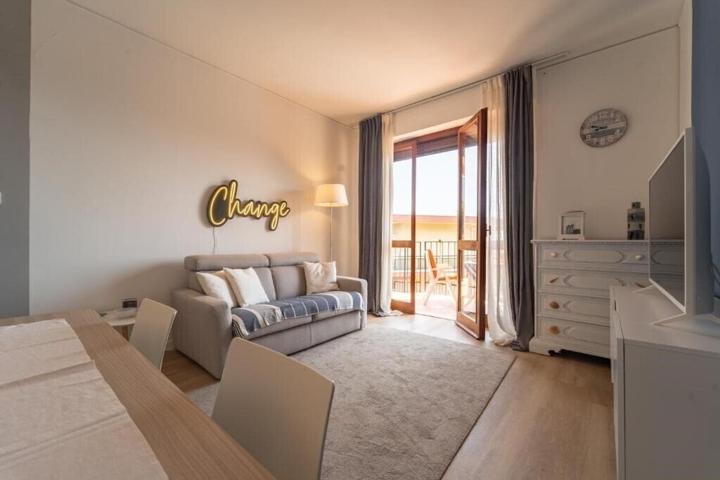 Фото Le Orchidee Apartments by Wonderful Italy 3*