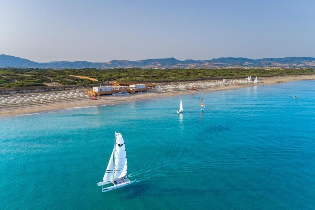 Фото Is Serenas Badesi Resort (ex. Bluserena Is Serenas Badesi Village) 4*