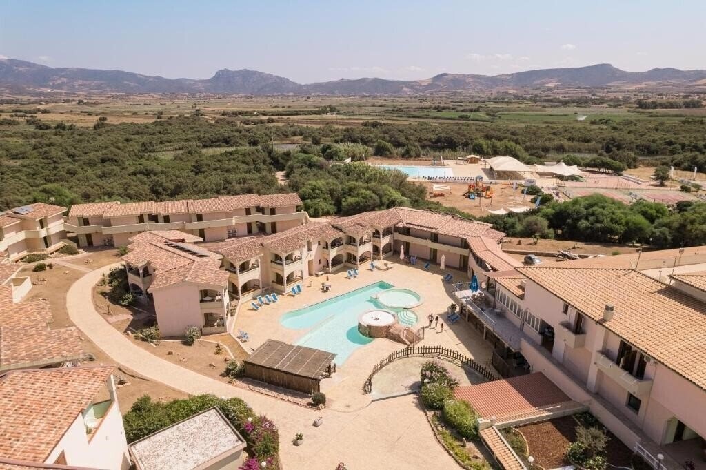 Фото Nicolaus Club Baia Delle Mimose отель без категории