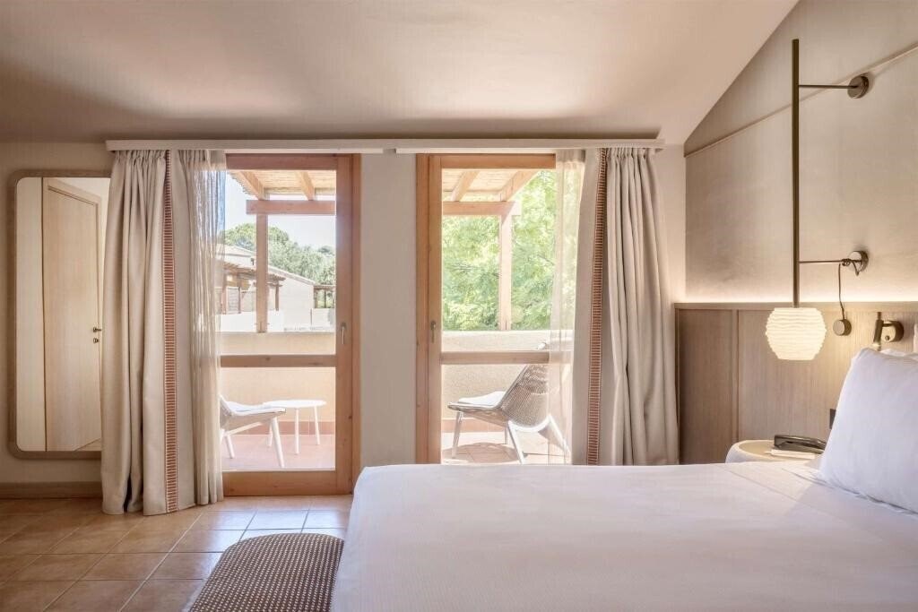 Фото Veridia Resort Chia, A Member of Radisson Individuals (ex. TH Parco Torre Chia, Parco Torre Chia, TH Torre Chia) 4*