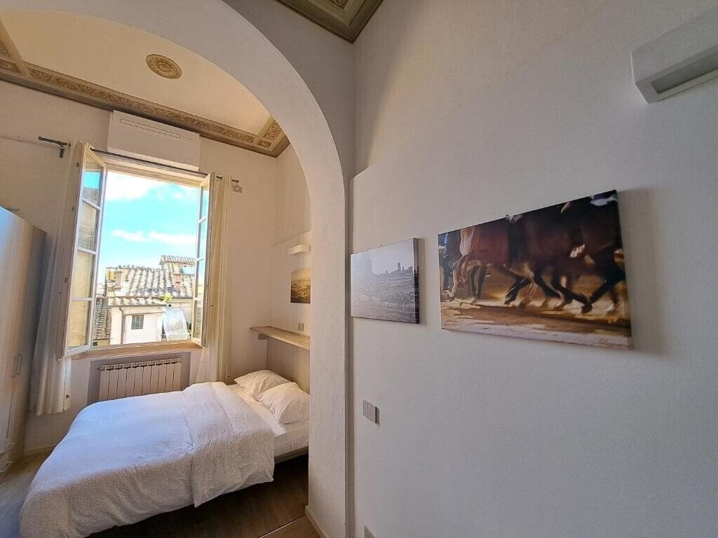 Фото Alloggio Ristrutturato a 50 Metri Da Piazza Del Campo 3*