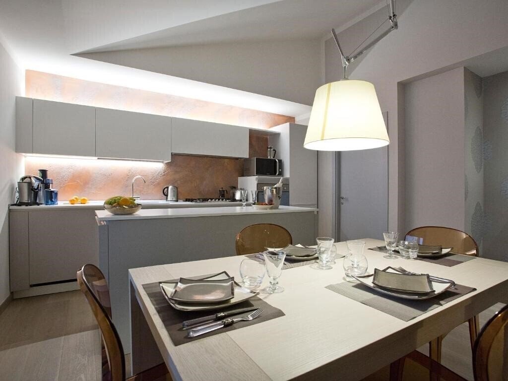 Фото Il Tolomei - Central in the Middle of Main Street 3*