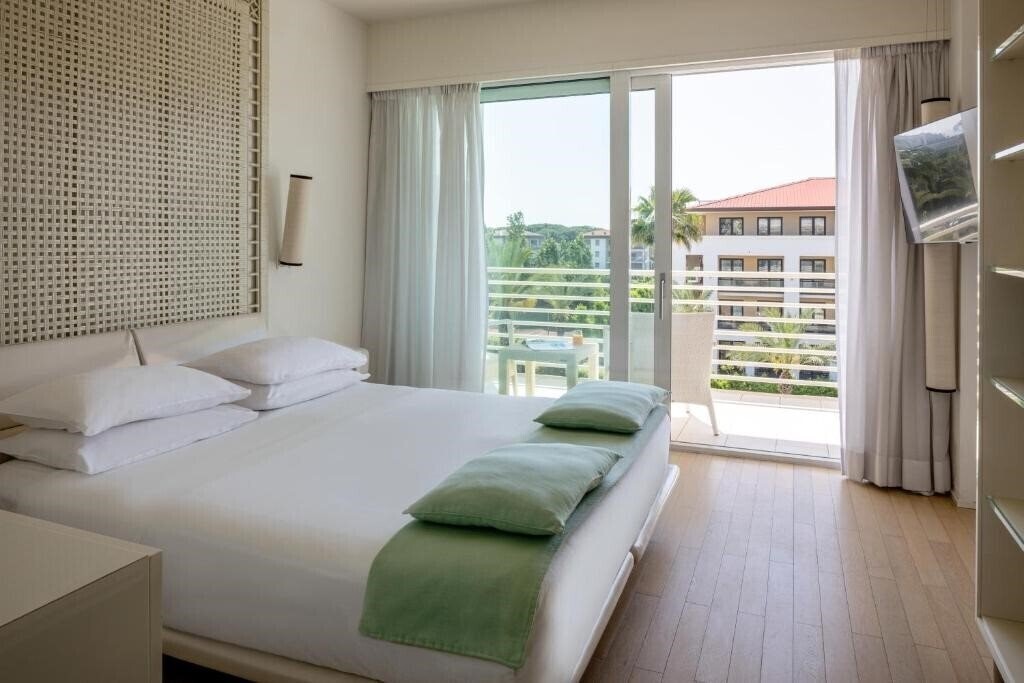 Фотографія Una Hotel Versilia (Lido di Camaiore) 4*