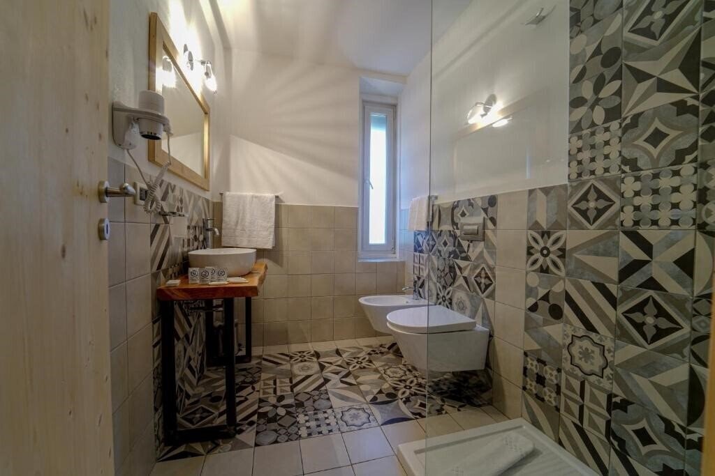 Фото Gh Monzoni (Pozza Di Fassa) 3*