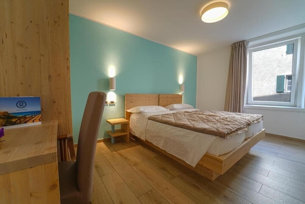 Картинка Gh Monzoni (Pozza Di Fassa) 3*